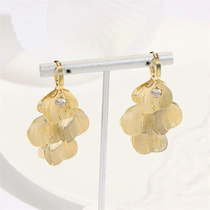 Women's earrings with a leaf-shaped pendant